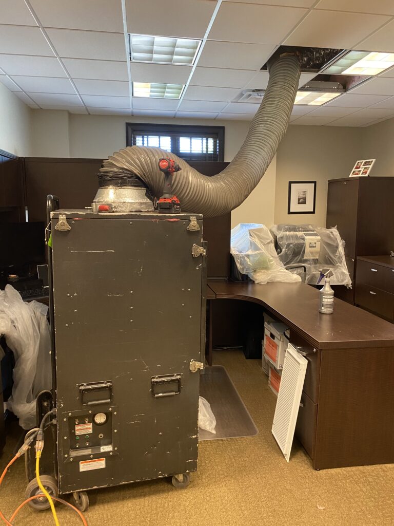 Efficient commercial air duct cleaning equipment in an office, ensuring clean and healthy indoor air.