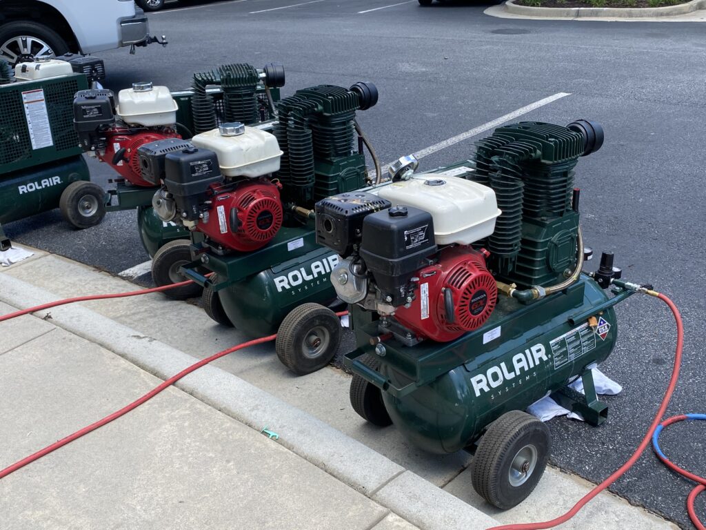 Rolair air compressors for commercial and residential duct cleaning, powered by Honda engines.